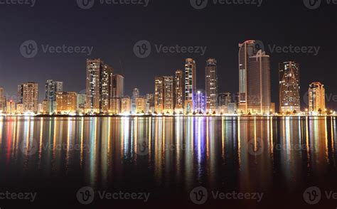 Skyline of Sharjah City at night 1367614 Stock Photo at Vecteezy