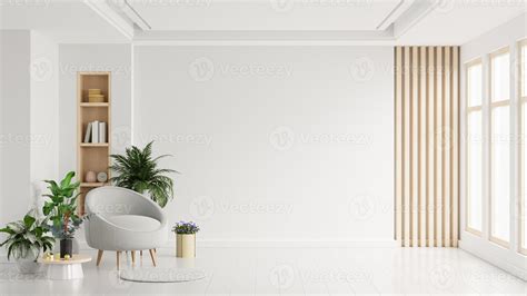 Modern minimalist interior with an armchair on empty white color wall ...