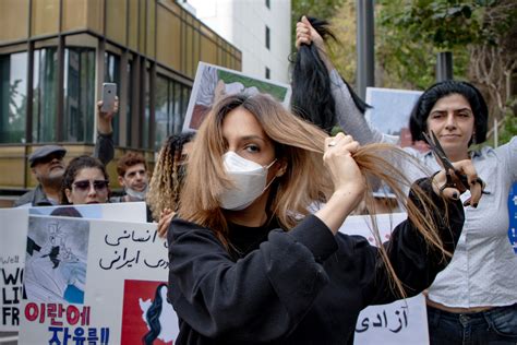 Iranian women cut their hair, burn hijabs in protest, call on the West ...