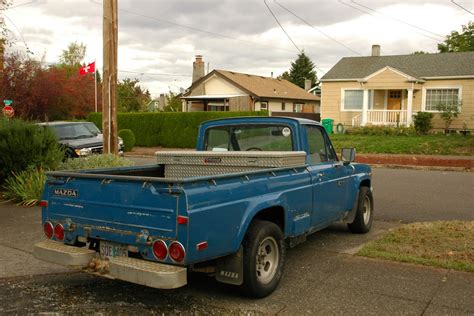 OLD PARKED CARS.: 1974 Mazda REPU.