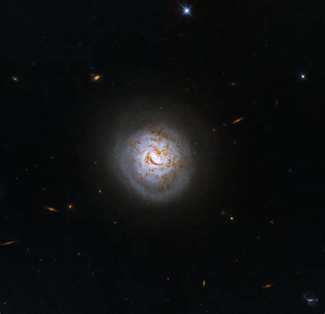 Space photo of the week: Hubble catches a 'baseball galaxy' with a ...