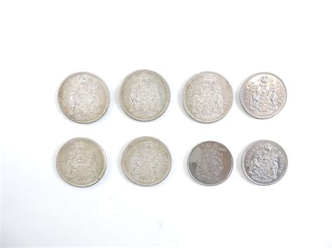 Police Auctions Canada - Lot of (8) Assorted Canada 50 Cent Coins (280860C)