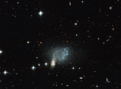 Hubble Image Shows Distant Galaxies Colliding