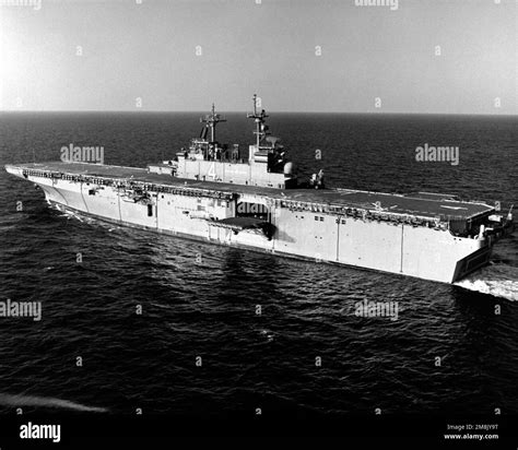 An aerial high oblique port quarter view of the amphibious assault ship ...