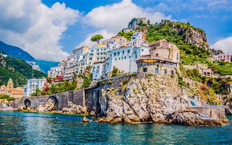 The small haven of Amalfi village with the tiny beach and colorful ...