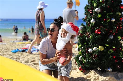 Thousands dressed in festive beach outfits flock to Bondi Beach and ...