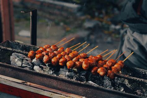 Bakso Bakar is Gril Meatballs with Peanuts Sauce Stock Photo - Image of ...