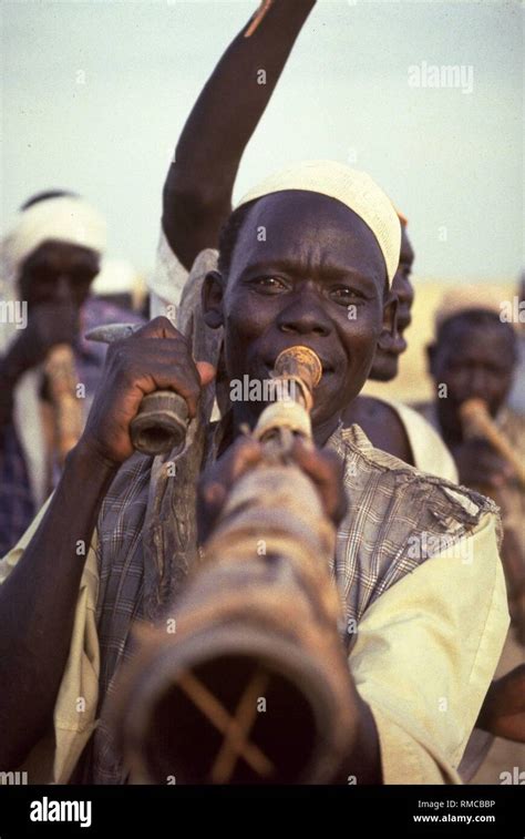 Sudanese musicians with wind instruments Stock Photo - Alamy