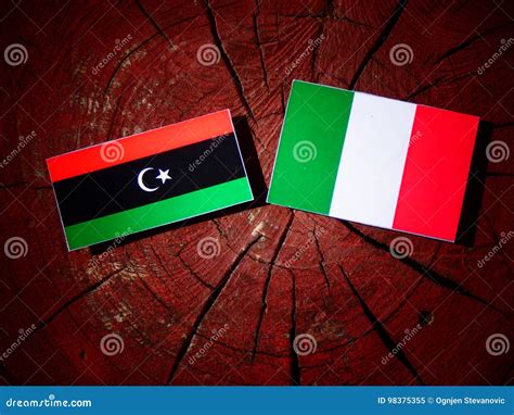 Libyan Flag with Italian Flag on a Tree Stump Isolated Stock ...