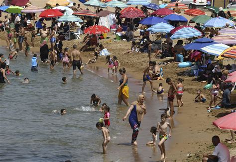 Algeria reopens mosques, beaches after 5-month lockdown | AP News