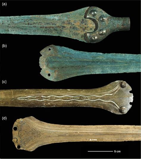 Four Early Bronze Age copper-damascened sword blades: (a) and (b) from ...