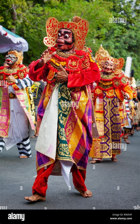 Dancer men in traditional Balinese costumes and masks Tari Wayang ...