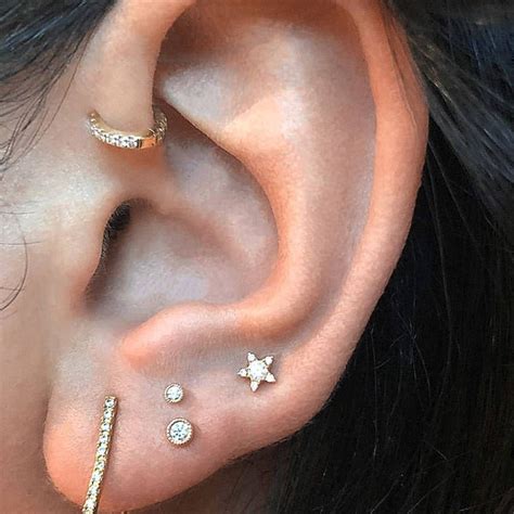 https://www.byrdie.co.uk/high-lobe-piercing--5b7595395e678?utm_source ...