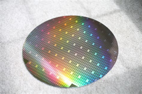 semiconductor process technology - Why do silicon wafers look rainbow ...