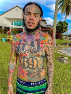 6ix9ine's 11 Tattoos & Their Meanings - Body Art Guru