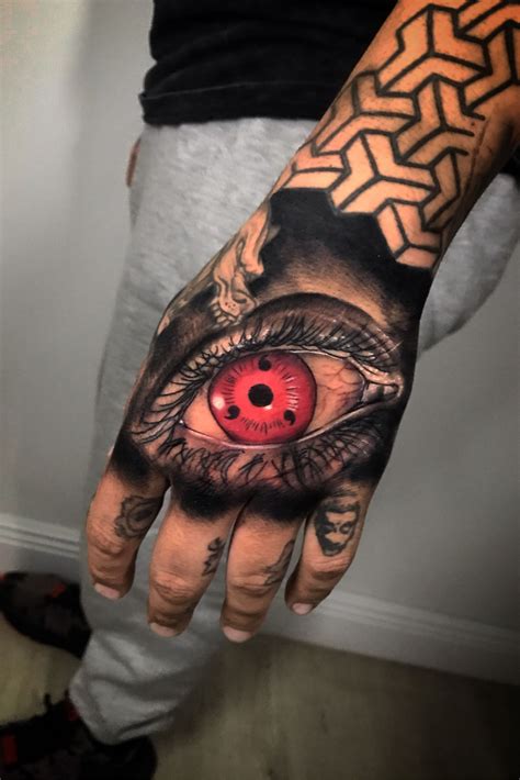 Sharingan Eye Tattoo On Hand ~ Sharingan Mangekyou Tatuajes Cuervo ...