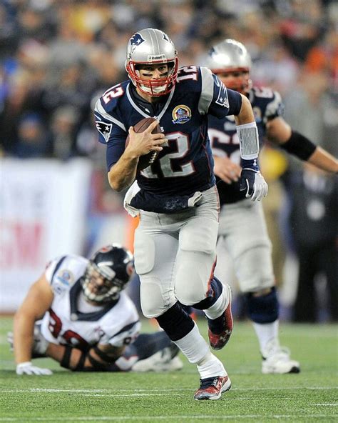 Tom Brady running with the football | Football helmets, Tom brady, Football