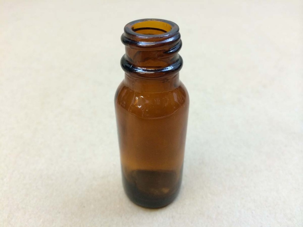  1/2 oz.   18 400 Amber  Boston Round  Glass   Bottle