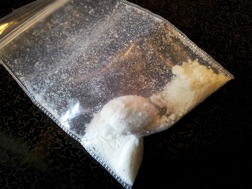 A little bag with Ketamine on the Right side and a nug of yayo on the left.
They go great together. Like if you can not drive and HAVE to be somewhere, but are kholed…just bump up a little yaay and your fucking good to drive.