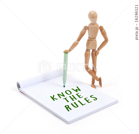 Wooden mannequin writing - Know the rules 16296321