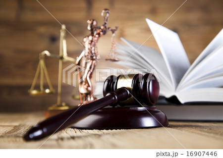 Wooden gavel and books, ambient light vivid theme 16907446