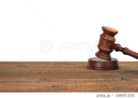 Judges Gavel On The Wood Table White Isolated  18685330