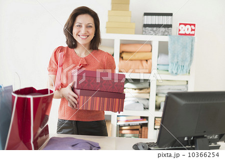 Portrait of woman in clothes store 10366254