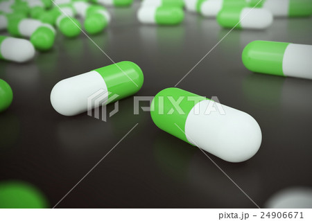 Heap of green white round capsule pills with 24906671