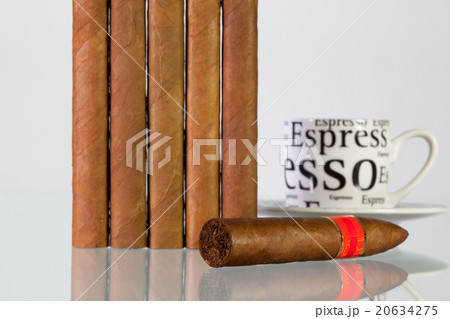 Different cigars and cup of coffee  20634275