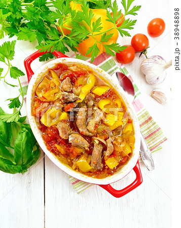 Ragout of meat and vegetables in red brazier top 38948898