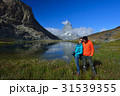 asian couple smiling  in front of Riffelsee lake  31539355