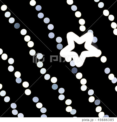 Bokeh with star of light on black background, 49886385