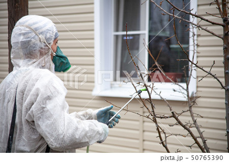 gardener trees covers pesticides 50765390