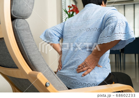 Old woman back pain at home, health problem concept 68602233