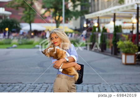 woman with chihuahua. 69842019