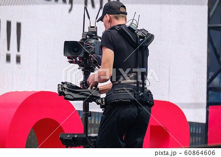 Steadicam camera man online broadcasting 60864606