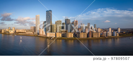 The skyscrapers of Canary Wharf in London on Isle of Dogs - panoramic view 97809507