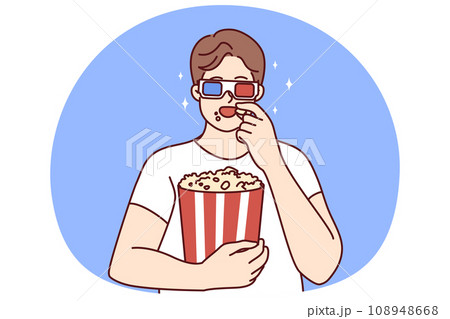 Man in 3D glasses eating popcorn 108948668