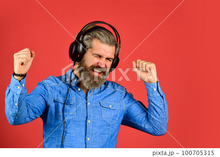 Music beat. Rhythm concept. Man bearded hipster headphones listening music. Hipster enjoy excellent sound song in earphones. Excellent music playlist. Noise cancellation function. Professional gadget 100705315