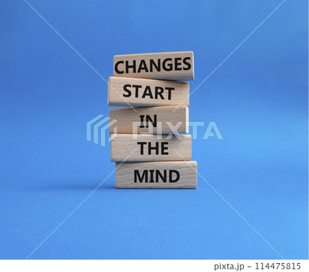 Changes start in the Mind symbol. Wooden blocks with words Changes start in the Mind. Beautiful blue background. Business and Changes start in the Mind concept. Copy space. 114475815