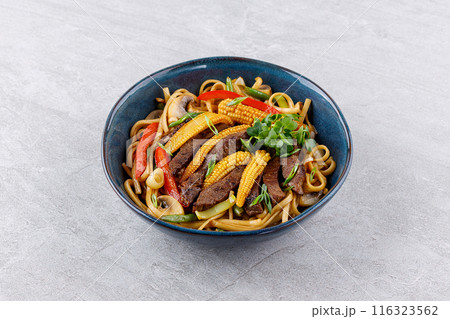 Udon noodles with beef and vegetables for the menu, website, restaurant or food delivery 116323562