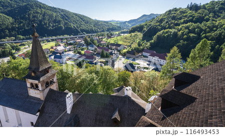 View from the top of medieval castle overlooking valley and village beneath, Slovakia, Europe 116493453