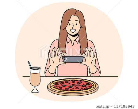 Woman takes picture of pizza on phone, wanting to make post on social network and talk about life 117198945