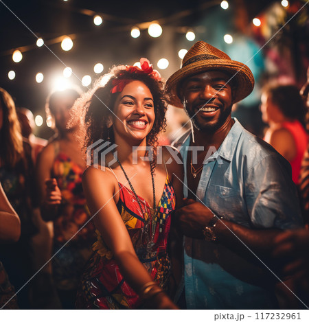 Friends dancing at a concert. Summer holiday, vacation concept. 117232961