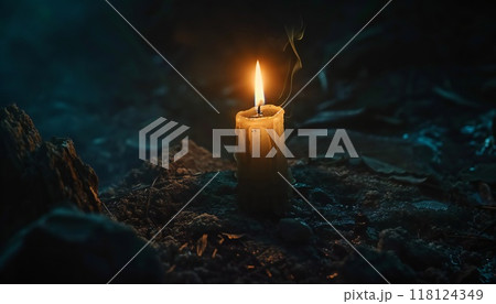 Visualization of a candle flickering in the night, embodying perseverance and hope 118124349