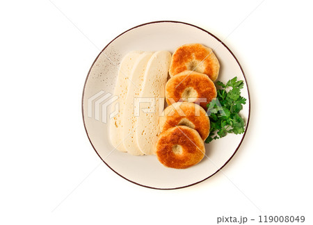 Mchadi, corn tortillas, traditional Georgian dish, corn bread, with Imeretian cheese, homemade, no people, on a light background, 119008049