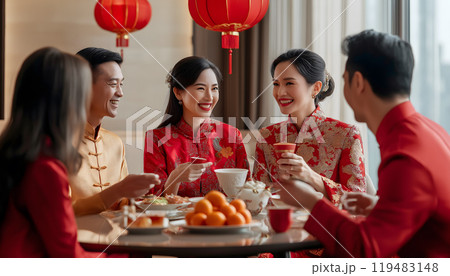 Family celebrating Chinese Happy New Year festival at table at home, restaurant 119483148