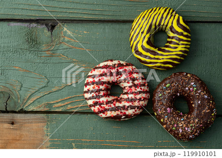 Sweet glazed colorful donuts . Top view 119910101