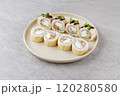 Japanese Sushi Rolls Philadelphia Uramaki Plate on Gray Background for Restaurant Menu or Food Delivery 120280580