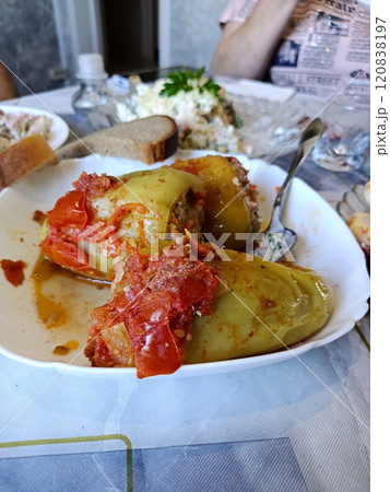 stuffed peppers, tomatoes, cheese and olives 120838197